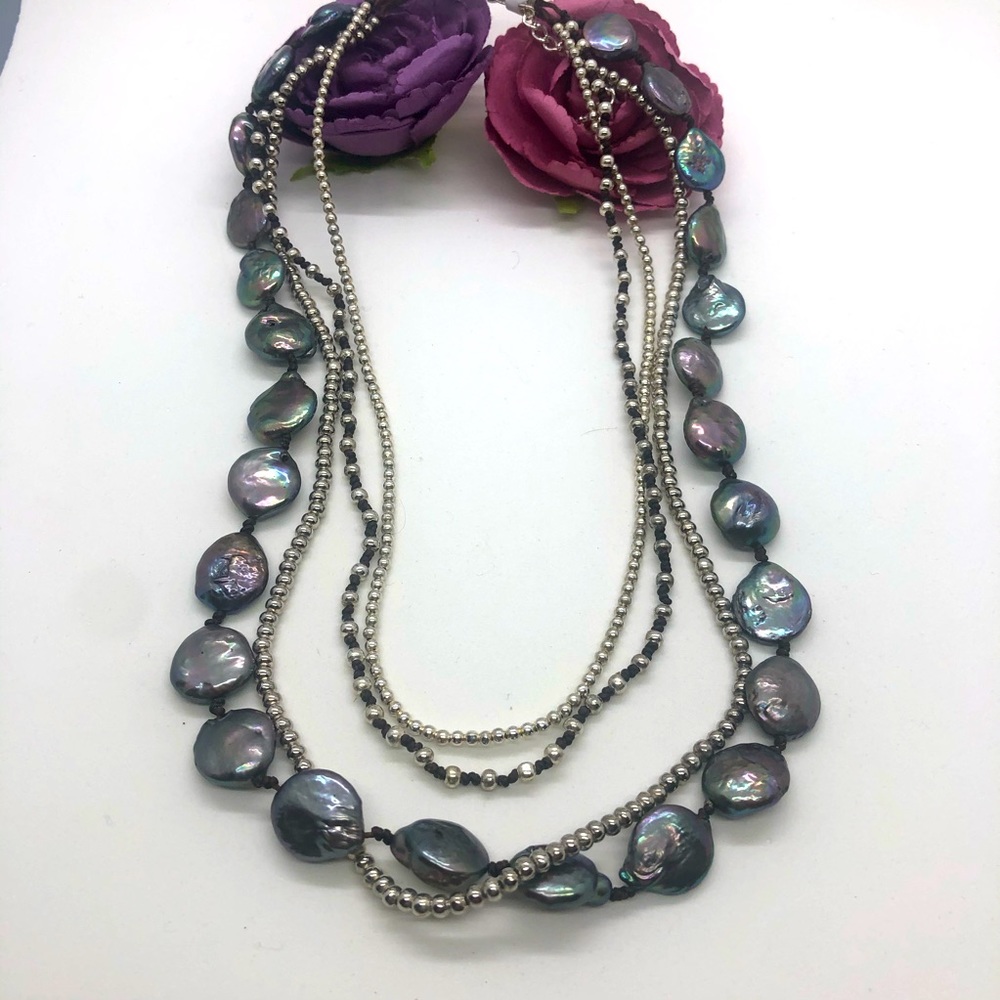Multi strand pearl and silver necklace